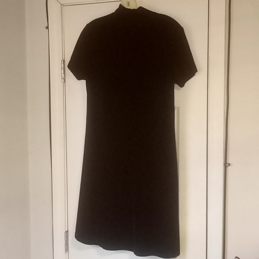 Beautiful never been worn black very sexy polyester dress